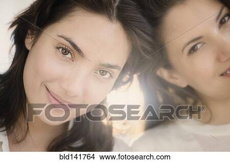 Picture - Hispanic women smiling. Fotosearch
