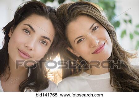 Stock Photography - Hispanic women smiling. Fotosearch