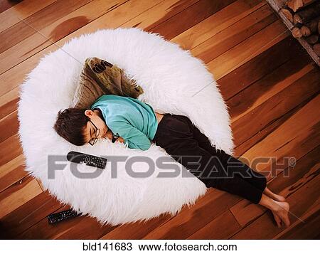 Mixed race girl napping in beanbag chair View Large Photo Image Stock Image - Mixed race girl napping in beanbag chair. Fotosearch