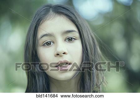 Picture - Mixed race girl outdoors. Fotosearch