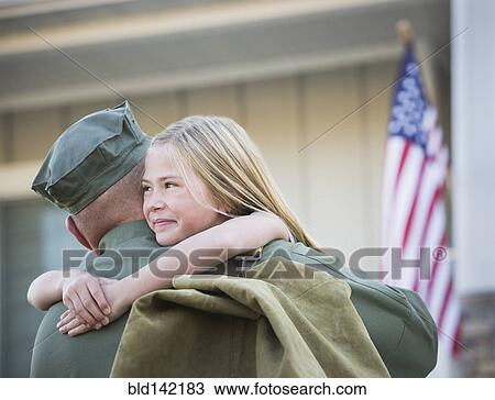 Returning Caucasian soldier hugging daughter View Large Photo Image Stock Image - Returning Caucasian soldier hugging daughter. Fotosearch