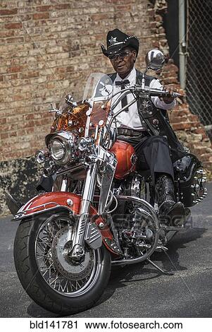 Senior African American man riding motorcycle View Large Photo Image Stock Image - Senior African American man riding motorcycle. Fotosearch