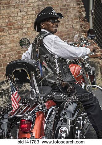 Senior African American man riding motorcycle View Large Photo Image Stock Image - Senior African American man riding motorcycle. Fotosearch