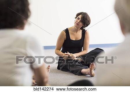 Picture - Students stretching in acting class. Fotosearch