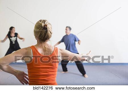Students stretching in acting class View Large Photo Image Stock Photograph - Students stretching in acting class. Fotosearch