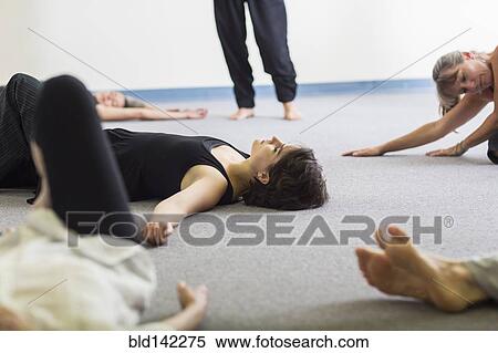Students stretching in acting class View Large Photo Image Stock Photography - Students stretching in acting class. Fotosearch