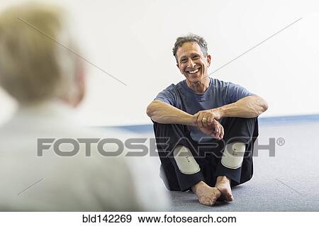 Teacher smiling at student in acting class View Large Photo Image Stock Photo - Teacher smiling at student in acting class. Fotosearch