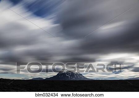 Blurred view of clouds over Mt Herdubried, Iceland View Large Photo Image Picture - Blurred view of clouds over Mt Herdubried, Iceland. Fotosearch