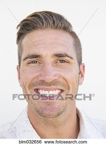 Stock Photograph - Caucasian man smiling . Fotosearch
