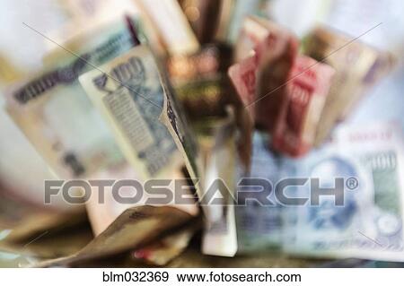 Close up of crumpled paper money View Large Photo Image Stock Photo - Close up of crumpled paper money. Fotosearch