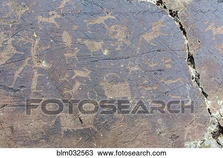 Close up of petroglyphs on rock formations, Altai Tavn Bogd National Park, Bayan Ulgii, Mongolia View Large Photo Image Stock Image - Close up of petroglyphs on rock formations, Altai Tavn Bogd National Park, Bayan Ulgii, Mongolia. Fotosearch
