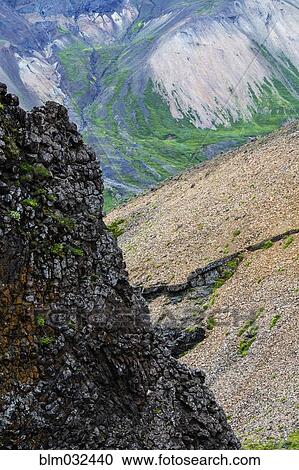 High angle view of rocky hillsides in mountain valley View Large Photo Image Stock Image - High angle view of rocky hillsides in mountain valley. Fotosearch
