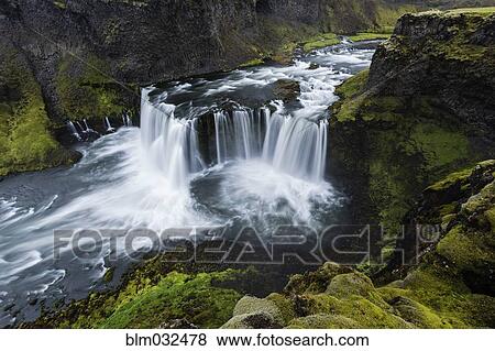 High angle view of waterfall and river in mountain rock formations View Large Photo Image Stock Photo - High angle view of waterfall and river in mountain rock formations. Fotosearch
