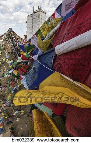 Low angle view of colorful prayer flags under hillside monastery, Leh, Ladakh, India View Large Photo Image Stock Photo - Low angle view of colorful prayer flags under hillside monastery, Leh, Ladakh, India. Fotosearch