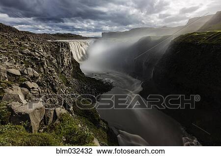 Mist rising from Dettifoss Falls, Myvatn, Iceland View Large Photo Image Stock Image - Mist rising from Dettifoss Falls, Myvatn, Iceland. Fotosearch