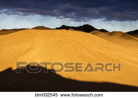 Sand dunes in desert landscape View Large Photo Image Stock Photography - Sand dunes in desert landscape. Fotosearch