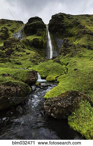 Waterfall and rock formations in remote river View Large Photo Image Stock Image - Waterfall and rock formations in remote river. Fotosearch