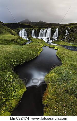 Waterfall, river and rock formations in remote landscape View Large Photo Image Picture - Waterfall, river and rock formations in remote landscape. Fotosearch