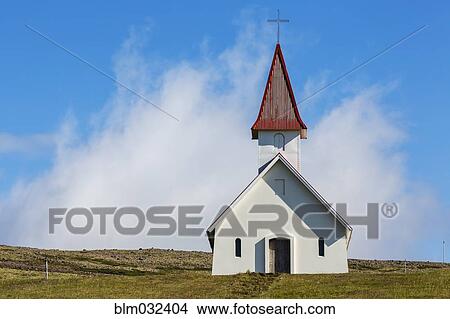 Picture - White church in rolling rural landscape. Fotosearch