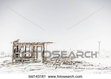 Stock Image - Abandoned structure in dirt lot. Fotosearch