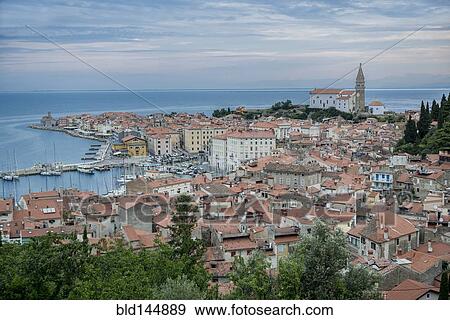 Stock Photo - Aerial view of buildings in cityscape, Piran, Coastal-Karst, Slovenia. Fotosearch