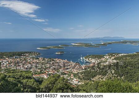 Aerial view of coastal town and hillside, Hvar, Split, Croatia View Large Photo Image Stock Photo - Aerial view of coastal town and hillside, Hvar, Split, Croatia. Fotosearch