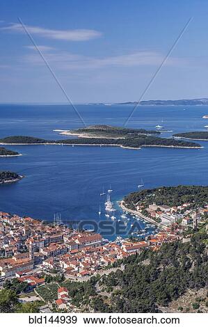 Aerial view of coastal town and islands, Hvar, Split, Croatia View Large Photo Image Stock Photo - Aerial view of coastal town and islands, Hvar, Split, Croatia. Fotosearch