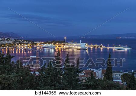 Aerial view of illuminated dock and cityscape of coastal town, Split, Split, Croatia View Large Photo Image Stock Photography - Aerial view of illuminated dock and cityscape of coastal town, Split, Split, Croatia. Fotosearch