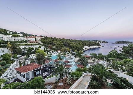 Aerial view of swimming pool at resort in coastal town, Hvar, Split, Croatia View Large Photo Image Stock Photograph - Aerial view of swimming pool at resort in coastal town, Hvar, Split, Croatia. Fotosearch