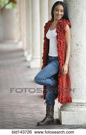 Black woman leaning on pillar View Large Photo Image Stock Photograph - Black woman leaning on pillar. Fotosearch