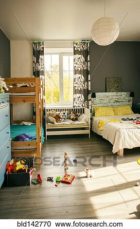 Bunk beds and crib in bedroom of child View Large Photo Image Stock Image - Bunk beds and crib in bedroom of child. Fotosearch