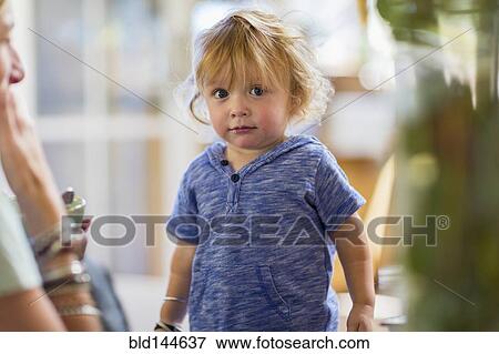 Stock Photo - Caucasian boy standing. Fotosearch