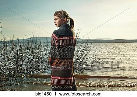 Caucasian girl standing on beach View Large Photo Image Stock Image - Caucasian girl standing on beach. Fotosearch