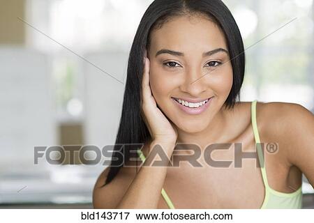 Stock Photo - Close up of Black woman smiling. Fotosearch