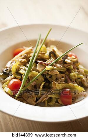 Stock Photo - Close up of bowl of vegetable salad. Fotosearch