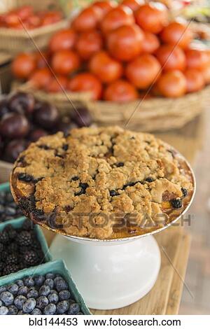 Close up of fruit crumble at farmers market View Large Photo Image Stock Image - Close up of fruit crumble at farmers market. Fotosearch