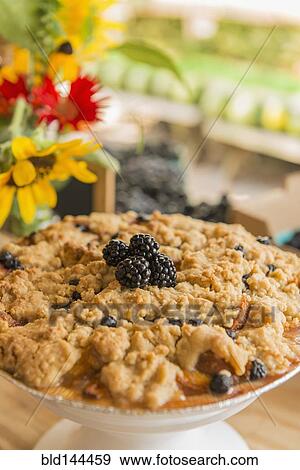 Close up of fruit crumble at farmers market View Large Photo Image Stock Photo - Close up of fruit crumble at farmers market. Fotosearch