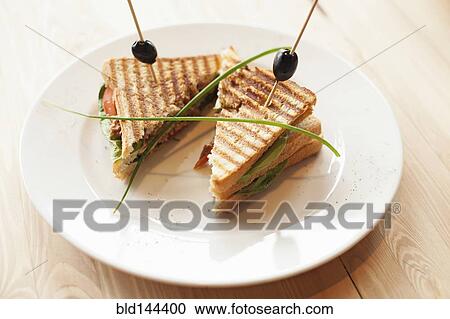 Close up of sandwiches on plate View Large Photo Image Stock Image - Close up of sandwiches on plate. Fotosearch