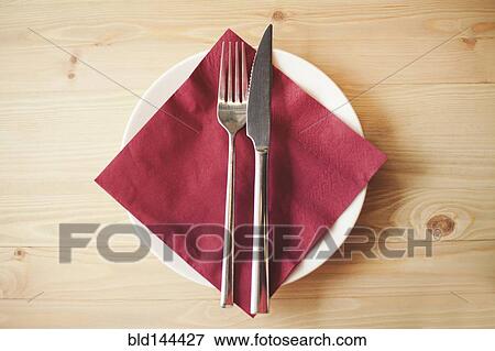 Close up of silverware, napkin and side plate View Large Photo Image Stock Photo - Close up of silverware, napkin and side plate. Fotosearch