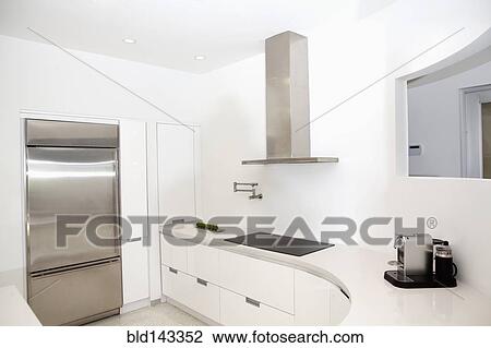 Countertop, refrigerator and stove in modern kitchen View Large Photo Image Stock Image - Countertop, refrigerator and stove in modern kitchen. Fotosearch