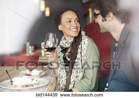 Couple talking in cafe View Large Photo Image Stock Photo - Couple talking in cafe. Fotosearch