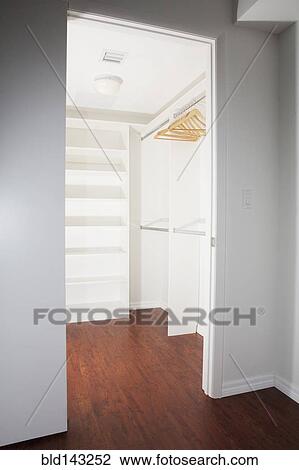 Door to empty walk-in closet View Large Photo Image Stock Image - Door to empty walk-in closet. Fotosearch