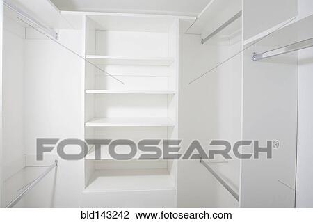 empty walk in closet walkin closet empty shelves in walkin closet stock photo of bld143242 search empty walk in closet walkin closet empty shelves in walkin closet stock photo of bld143242 search