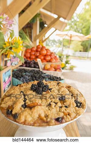 Picture - Fruit crumble at farmers market. Fotosearch