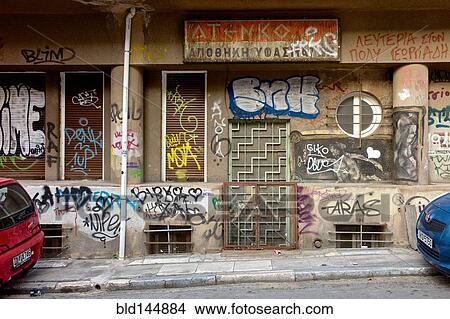 Graffiti covering urban wall in city View Large Photo Image Picture - Graffiti covering urban wall in city. Fotosearch