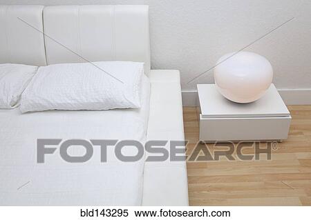 High angle view of bed and night table in modern bedroom View Large Photo Image Stock Photography - High angle view of bed and night table in modern bedroom. Fotosearch