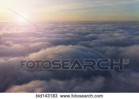 High angle view of sky above clouds View Large Photo Image Stock Image - High angle view of sky above clouds. Fotosearch