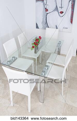 Picture - High angle view of table and chairs in modern dining room. Fotosearch