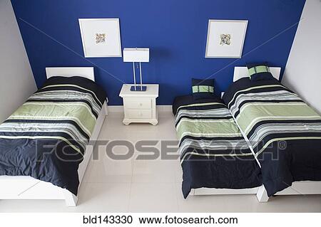High angle view of trundle and twin beds in bedroom View Large Photo Image Stock Image - High angle view of trundle and twin beds in bedroom. Fotosearch