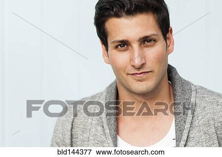 Stock Photo - Hispanic man smiling. Fotosearch